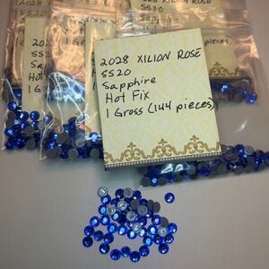 Swarovski • Color: Sapphire, 2028 XILION Rose Hotfix Rhinestones